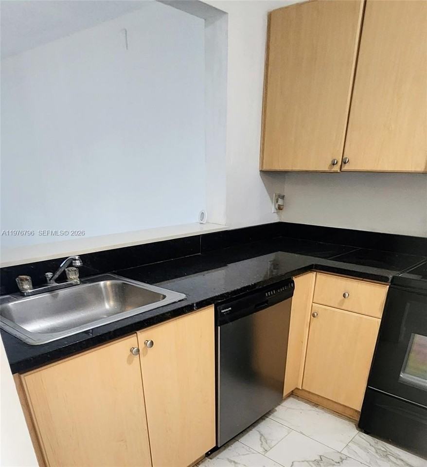 902 Ne 209th St #203-40 - Photo 2 of 14