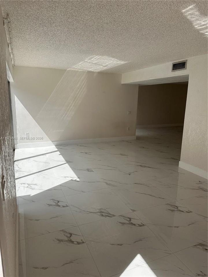 8440 Sw 154th Circle Ct #302 - Photo 2 of 31