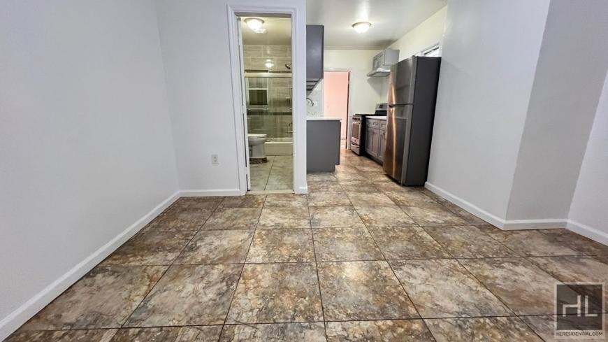 718 E 39th St - Photo 4 of 10