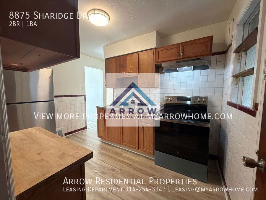 8875 Sharidge Dr - Photo 2 of 14