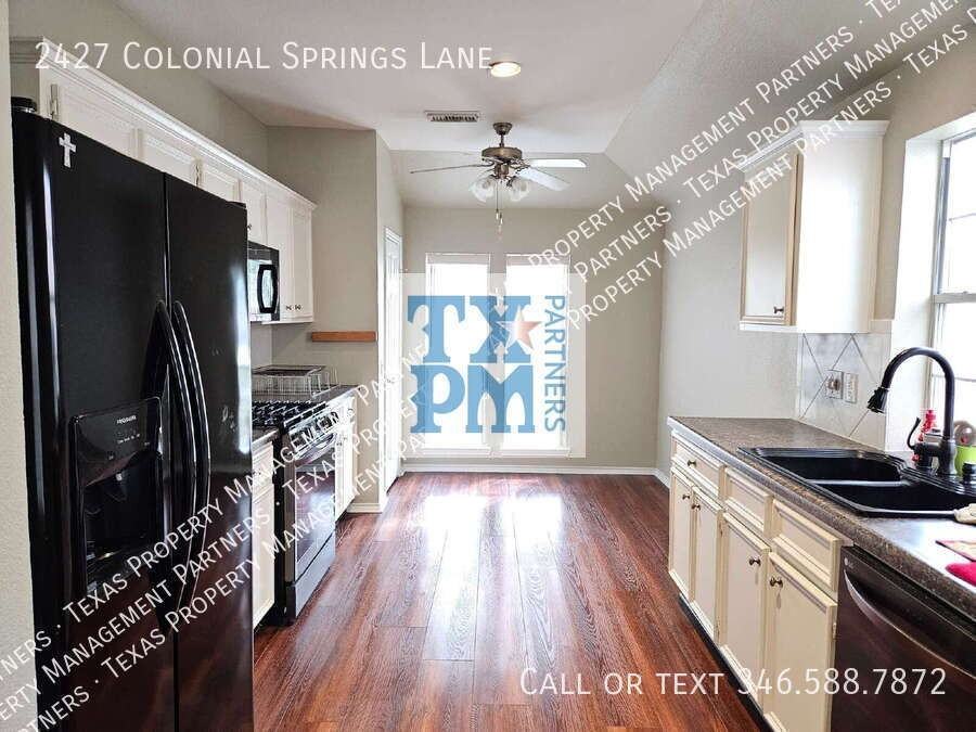 2427 Colonial Springs Ln - Photo 3 of 14