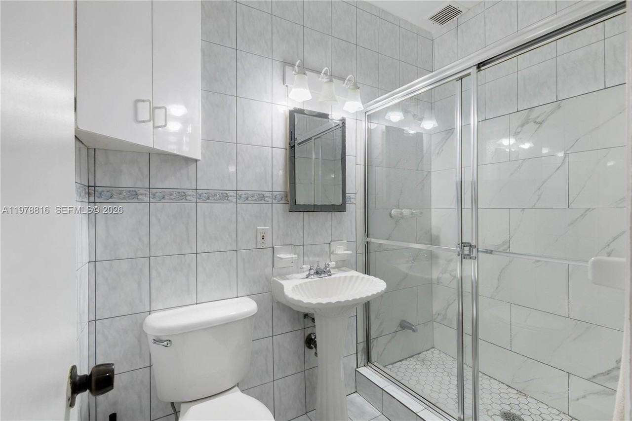 2445 Lake Pancoast Dr #J - Photo 2 of 31