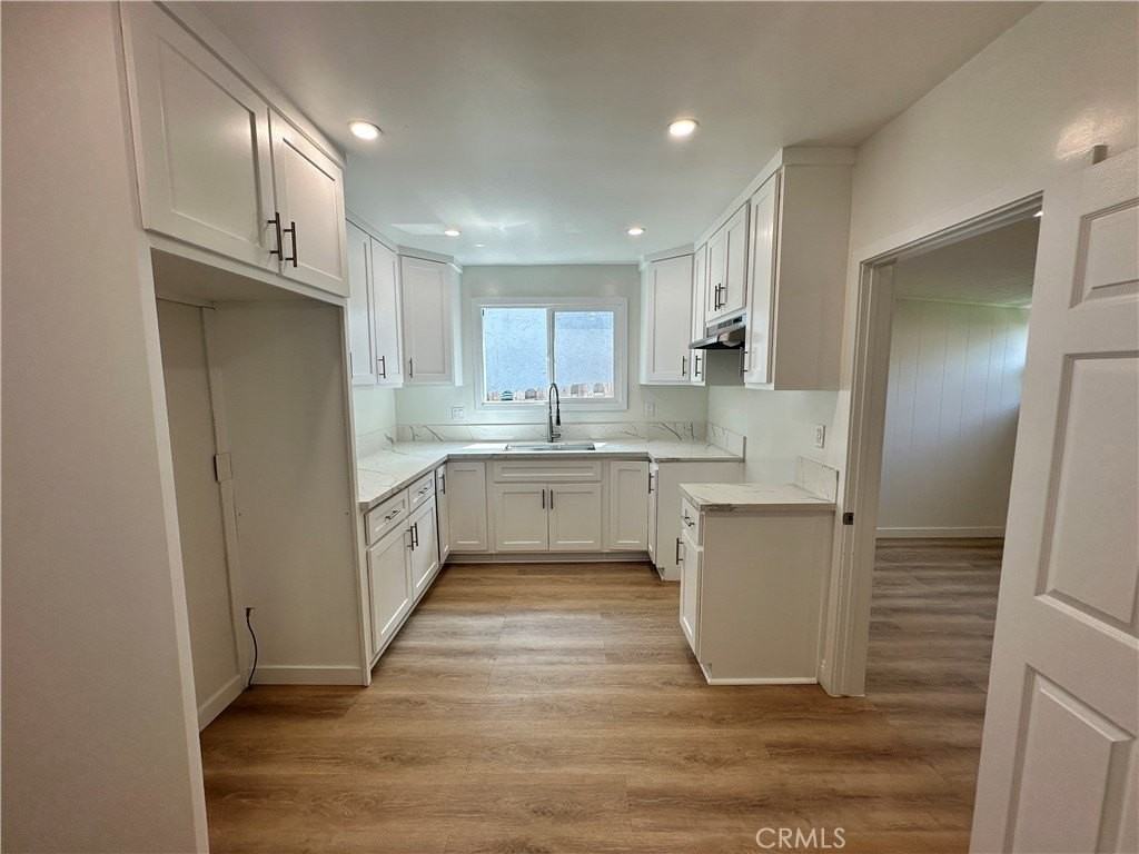 4450 W 169th St - Photo 4 of 33