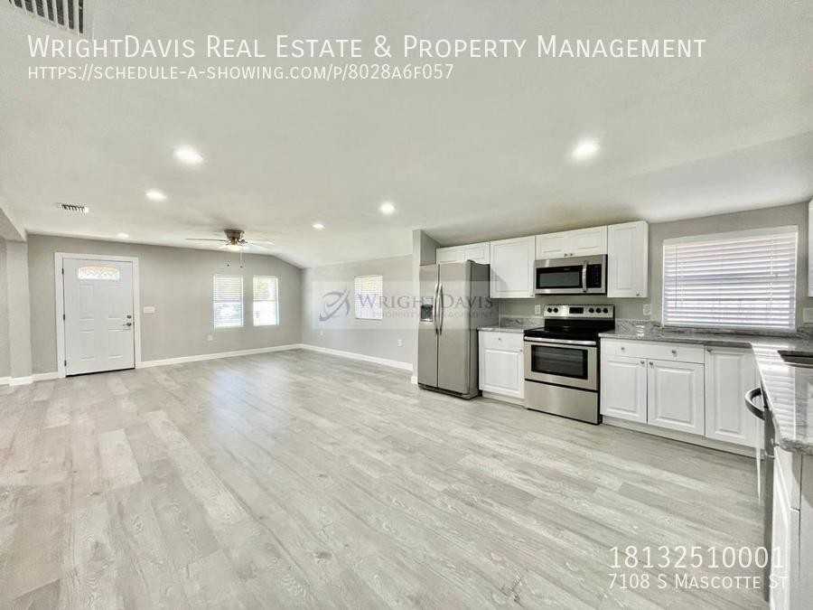 7108 S Mascotte St - Photo 6 of 30