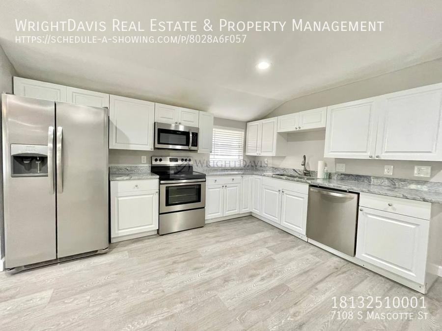 7108 S Mascotte St - Photo 7 of 30