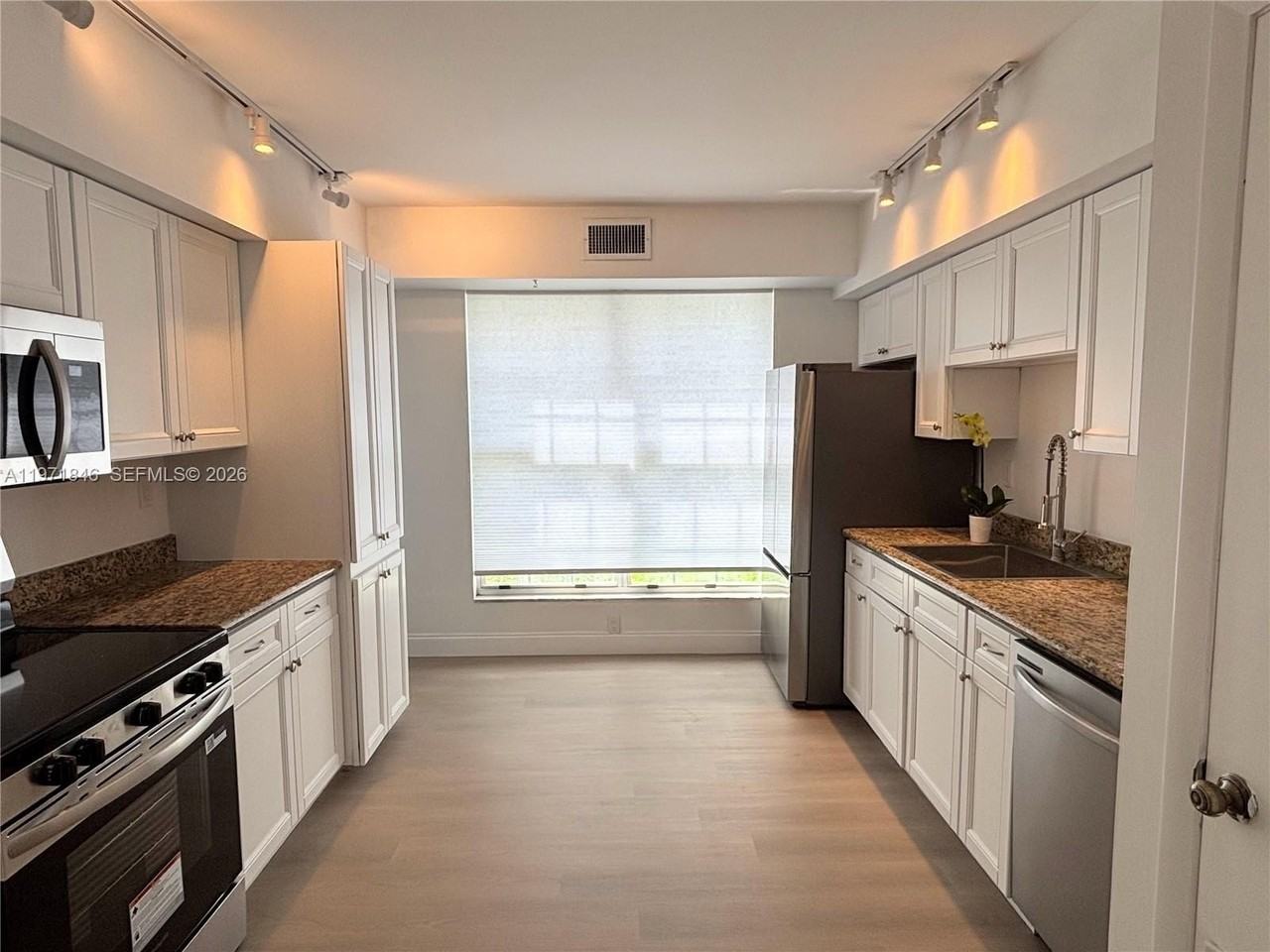 6245 Old Court Rd #102 - Photo 4 of 14