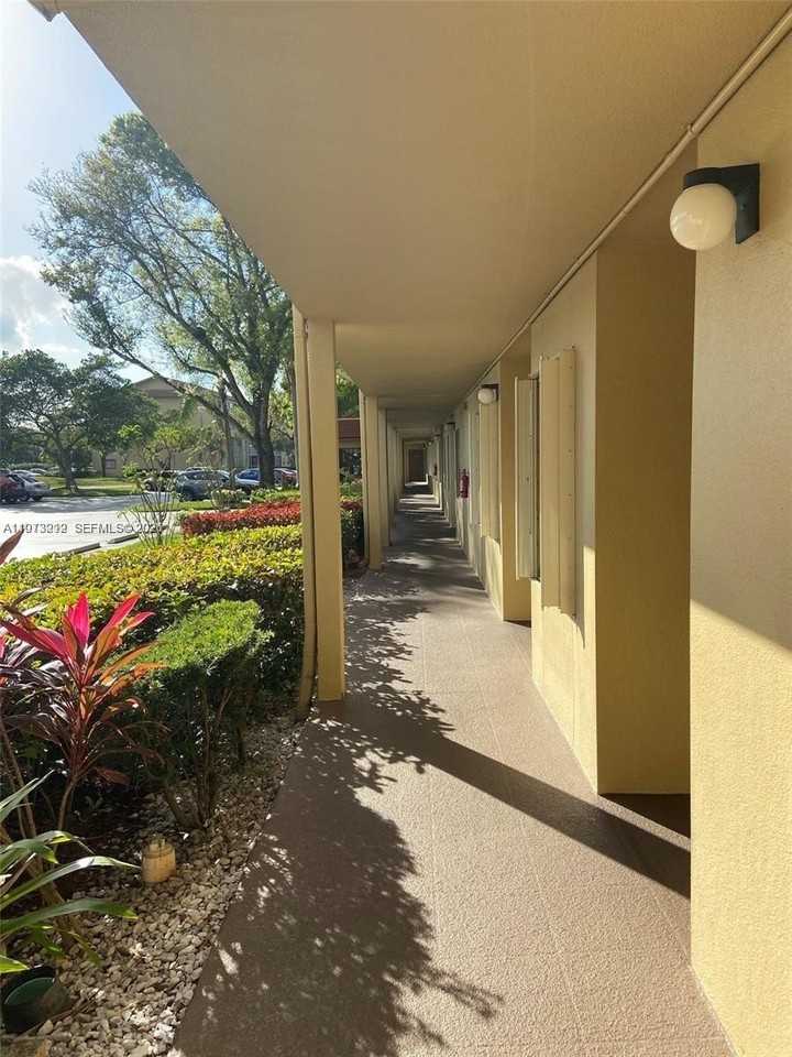 12601 Sw 13th St #303G - Photo 2 of 11