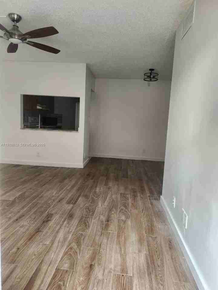 10037 Winding Lake Rd #102 - Photo 4 of 17