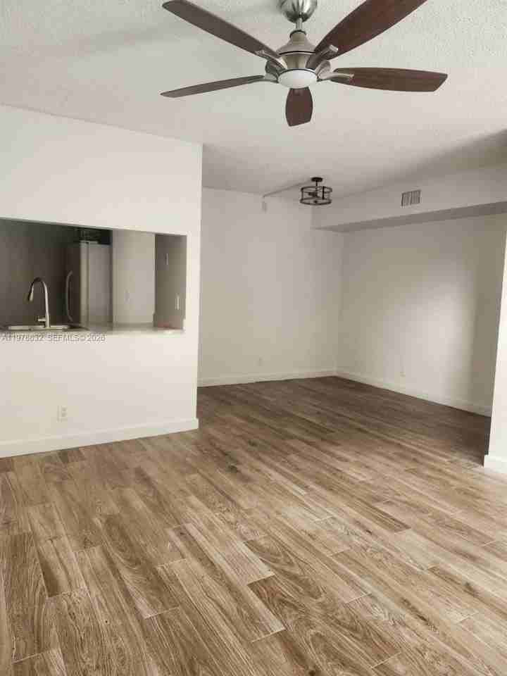 10037 Winding Lake Rd #102 - Photo 5 of 17