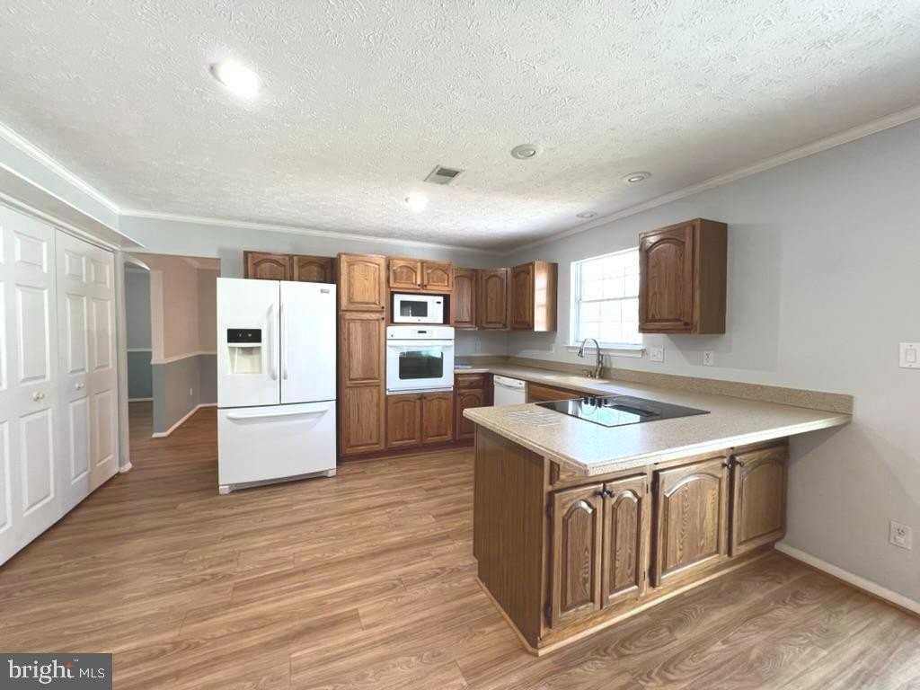 8220 Grainfield Rd - Photo 6 of 23