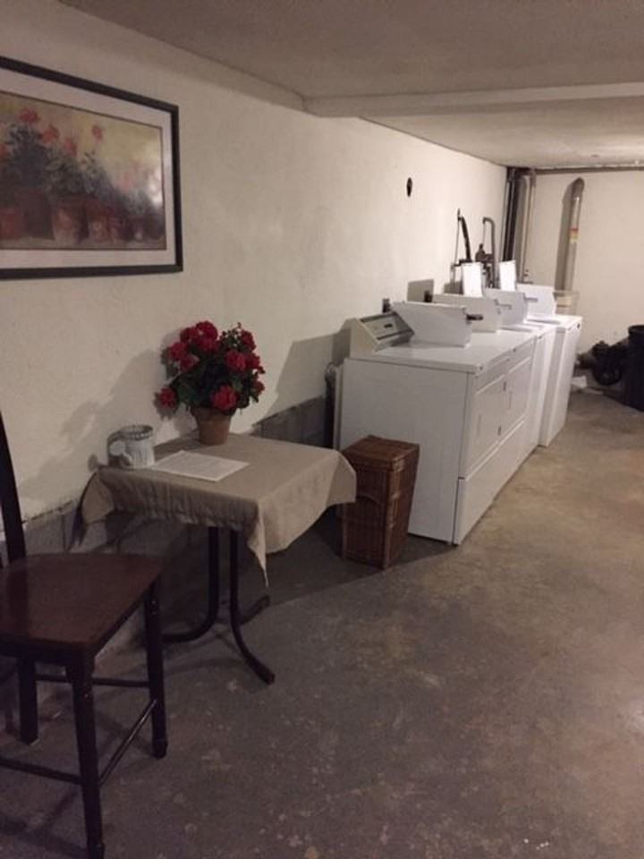 Two Bedroom unit, hot water included, free storage, porch, laundry, parking - Photo 6 of 10