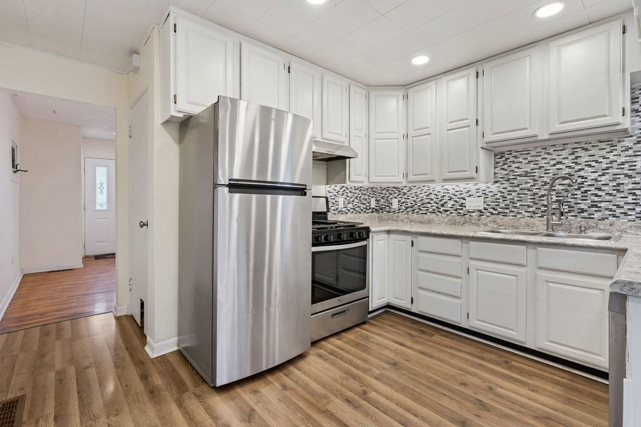 1206 Amos Ave - Photo 6 of 27