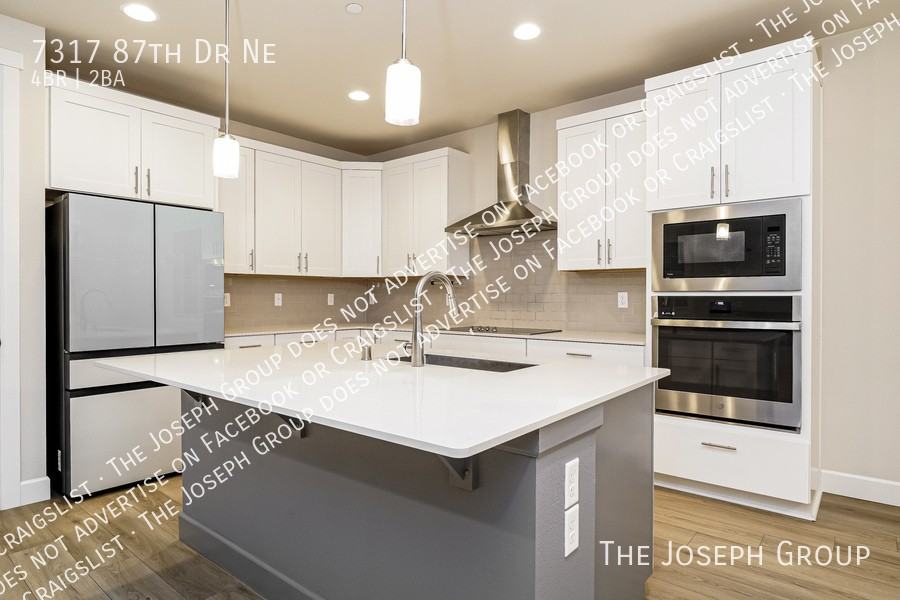 7317 87th Dr Ne - Photo 7 of 27