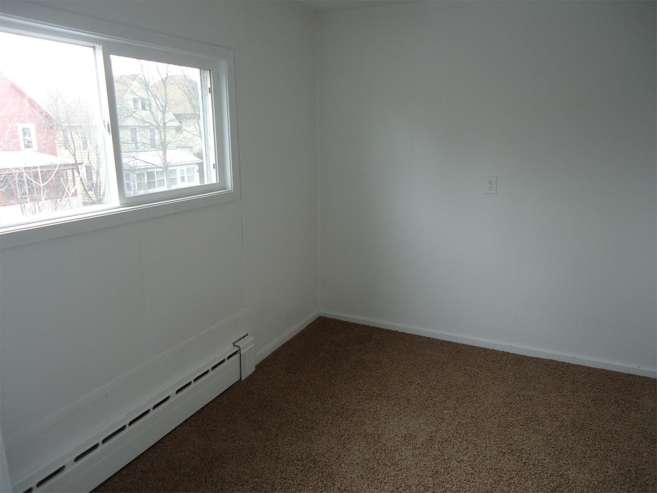 115 3RD ST S - Photo 3 of 14