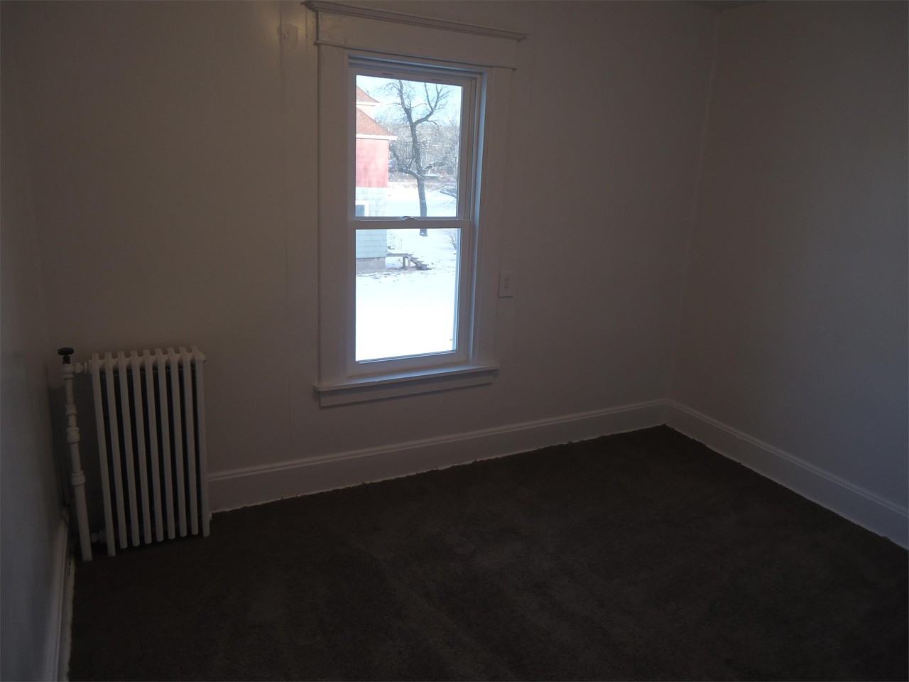 115 3RD ST S - Photo 4 of 8