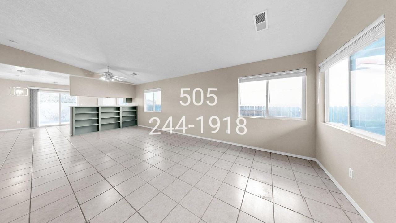 6908 Gabbro Ave Ne - Photo 5 of 35