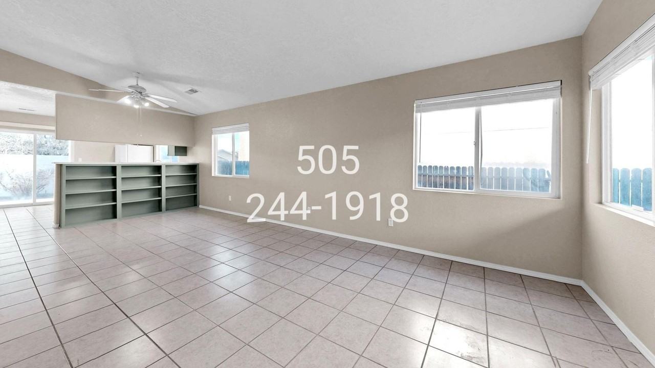 6908 Gabbro Ave Ne - Photo 6 of 35