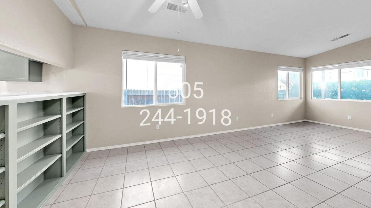 6908 Gabbro Ave Ne - Photo 7 of 35