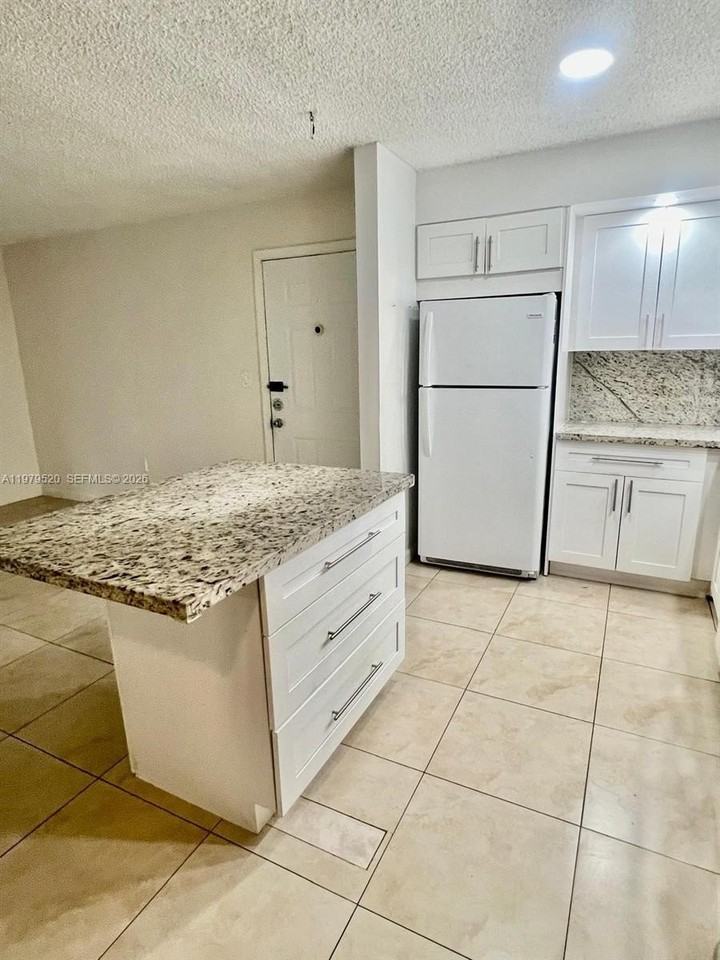 19055 Nw 62nd Ave #102 - Photo 5 of 5