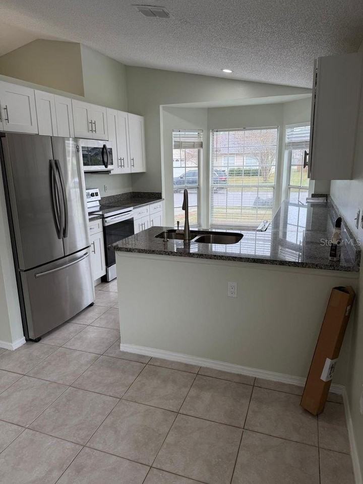 13875 Glasser Ave - Photo 4 of 20