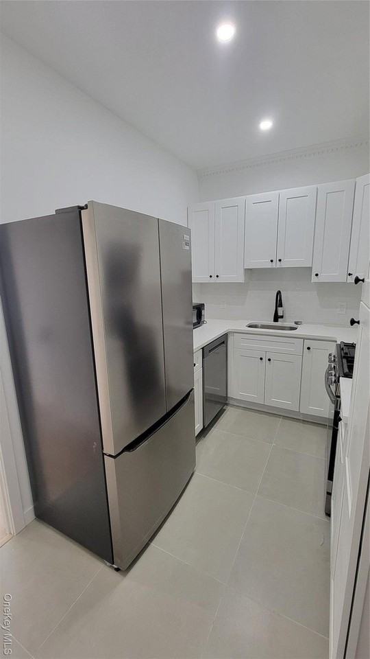 6024 Wetherole St Unit 3 - Photo 6 of 15