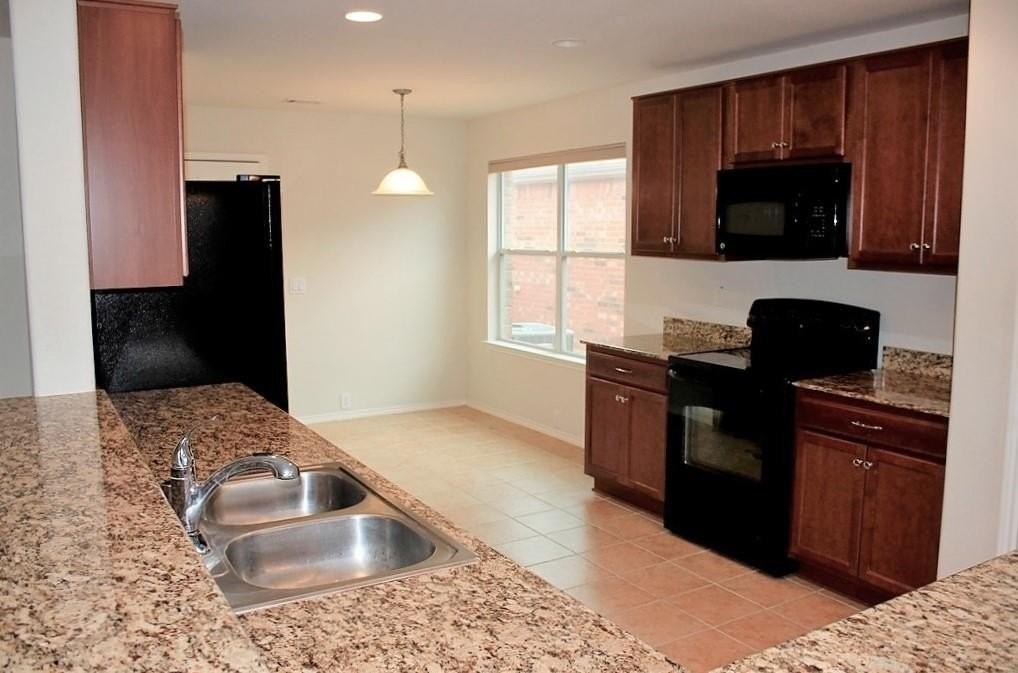 15949 Blaketree Dr - Photo 7 of 13