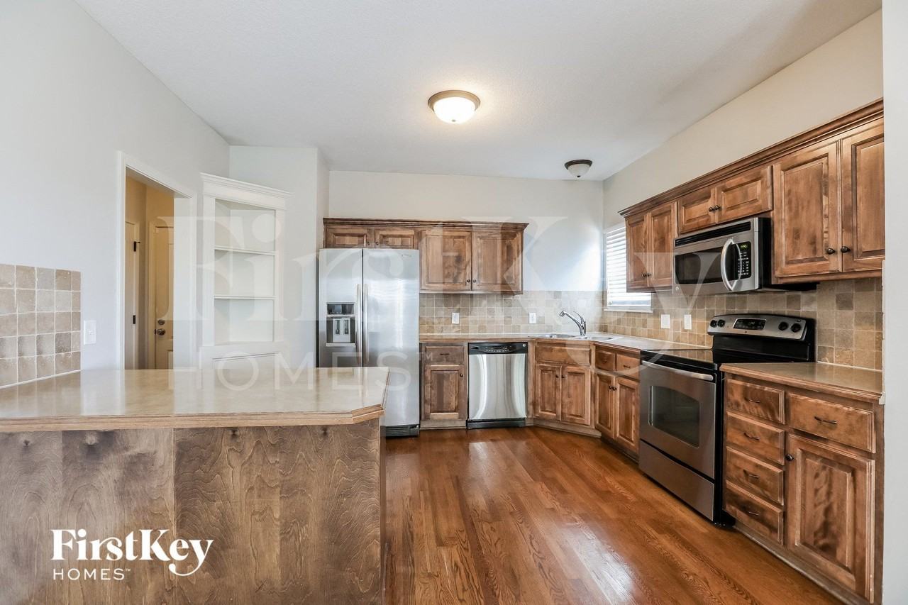 8944 Ne Paw Paw Dr - Photo 6 of 15