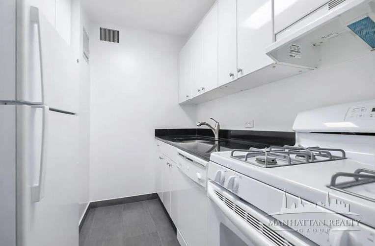 E 46th St #701 - Photo 4 of 6