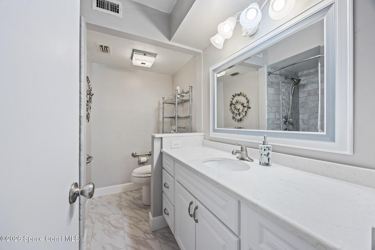 7050 N Highway 1 Apt 106 - Photo 5 of 9