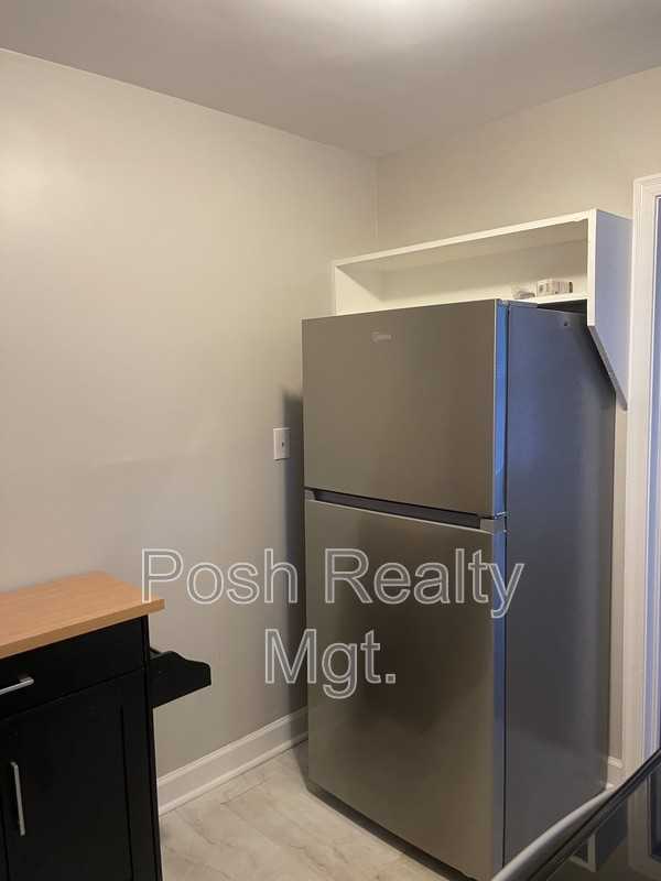 1207 N Elam Ave - Photo 5 of 12