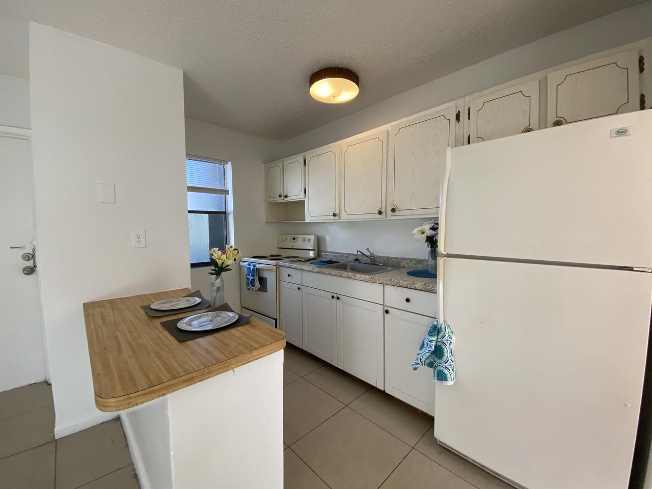 116 NE 9 th St (1142 Realty Inc) Cozy Terrace PLEASE READ T - Photo 5 of 10