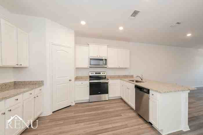 17001 Dusty Boots Ln - Photo 5 of 25