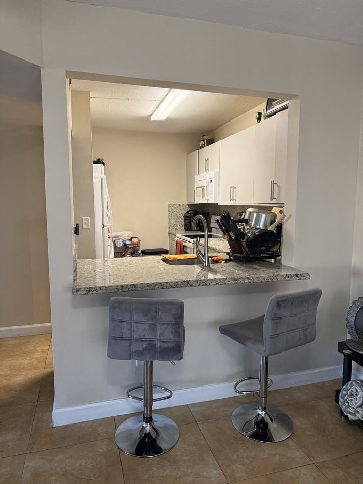 15328 Sunset Dr #8-12 - Photo 4 of 10