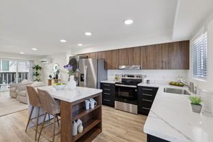 The Adelaide on 4th | Spacious 3 Bedroom + Den Homes Now Leasing - Photo 1 of 1
