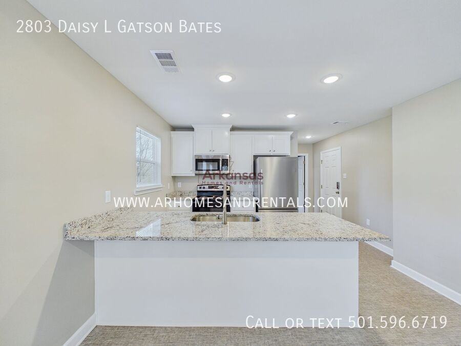 2803 W Daisy L Gatson Bates Dr - Photo 5 of 13