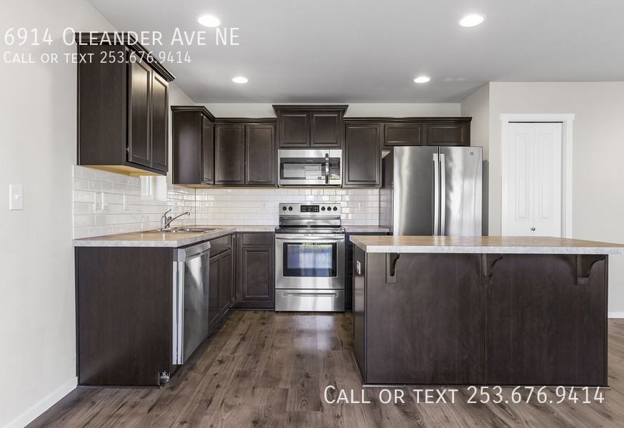 6914 Oleander Ave Ne - Photo 2 of 21