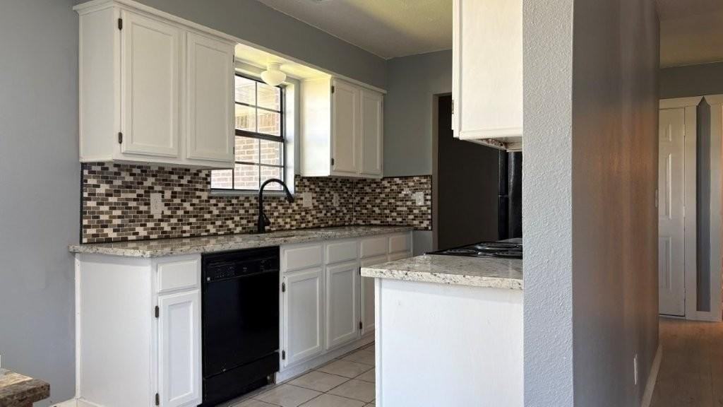 619 E 1st St - Photo 7 of 15