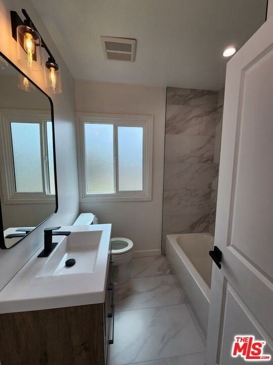 6121 Sylvia Ave - Photo 5 of 32