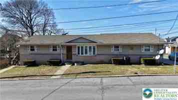 featured image of 302 Cypress St Side 1