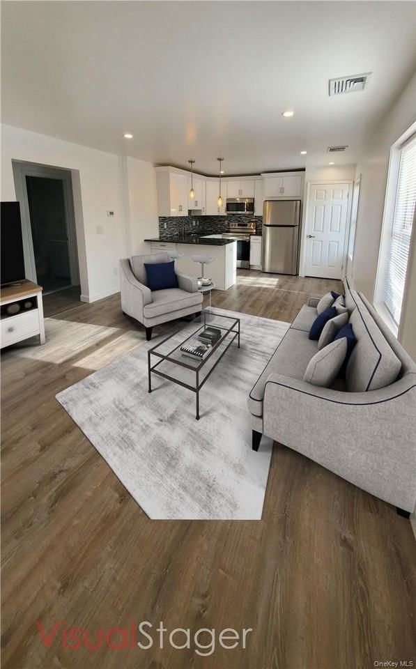 7 White Plains Ave - Photo 4 of 20