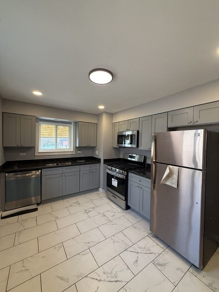 7732 Lotus Ave - Photo 2 of 6