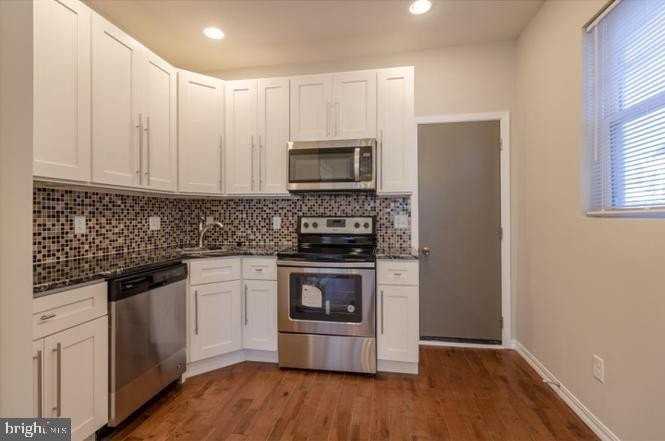 6241 N Woodstock St - Photo 4 of 15