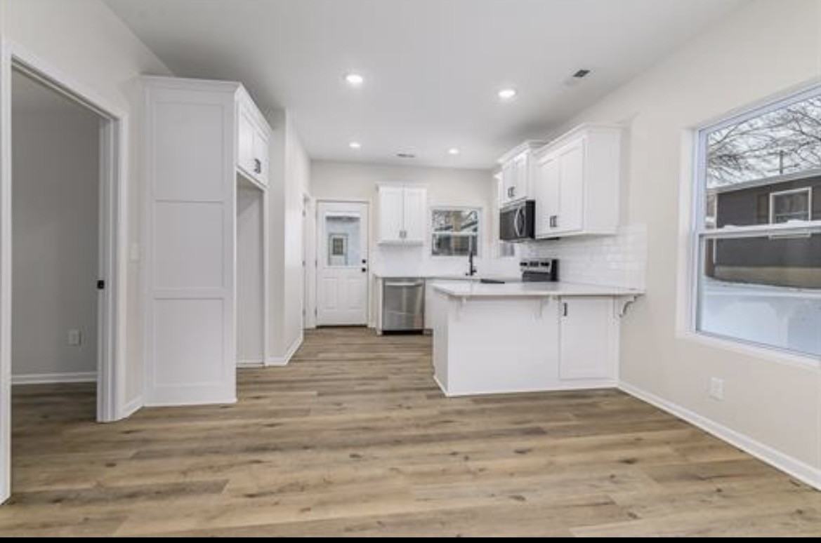 308 E 2nd St - Photo 2 of 11