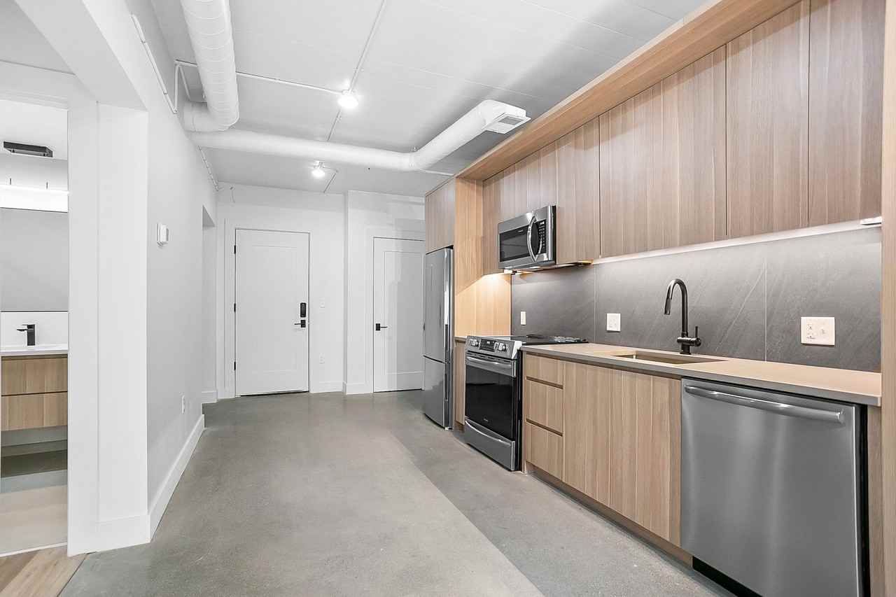 The Brit Apartments - Photo 7 of 43