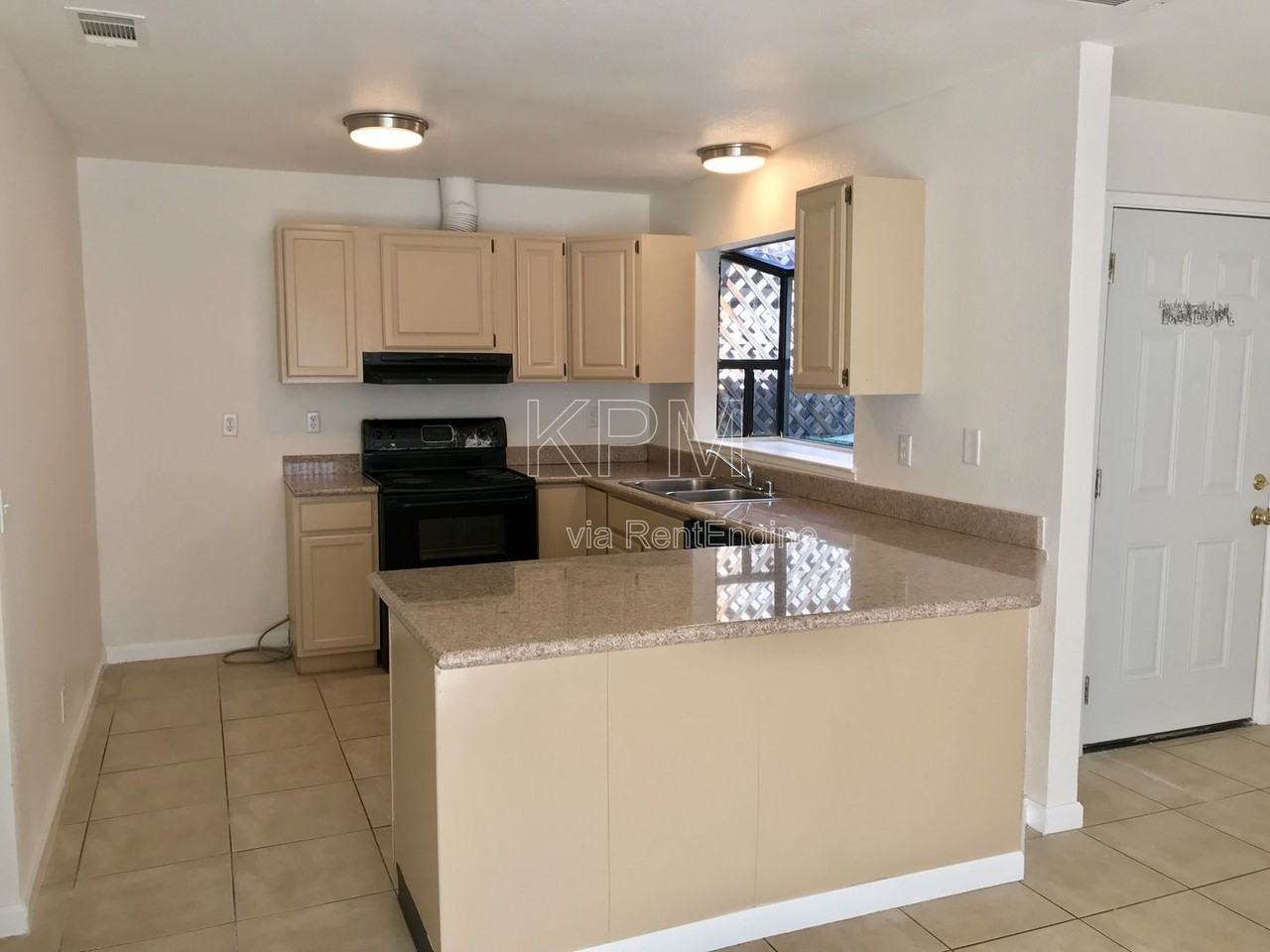 7409 Village Green Dr - Photo 5 of 15