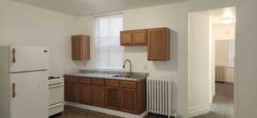 featured image of 119 E 3rd St