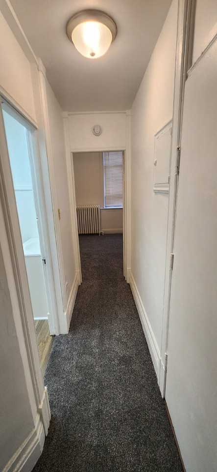 119 E 3rd St - Photo 3 of 7