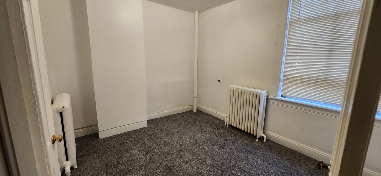 119 E 3rd St - Photo 4 of 7