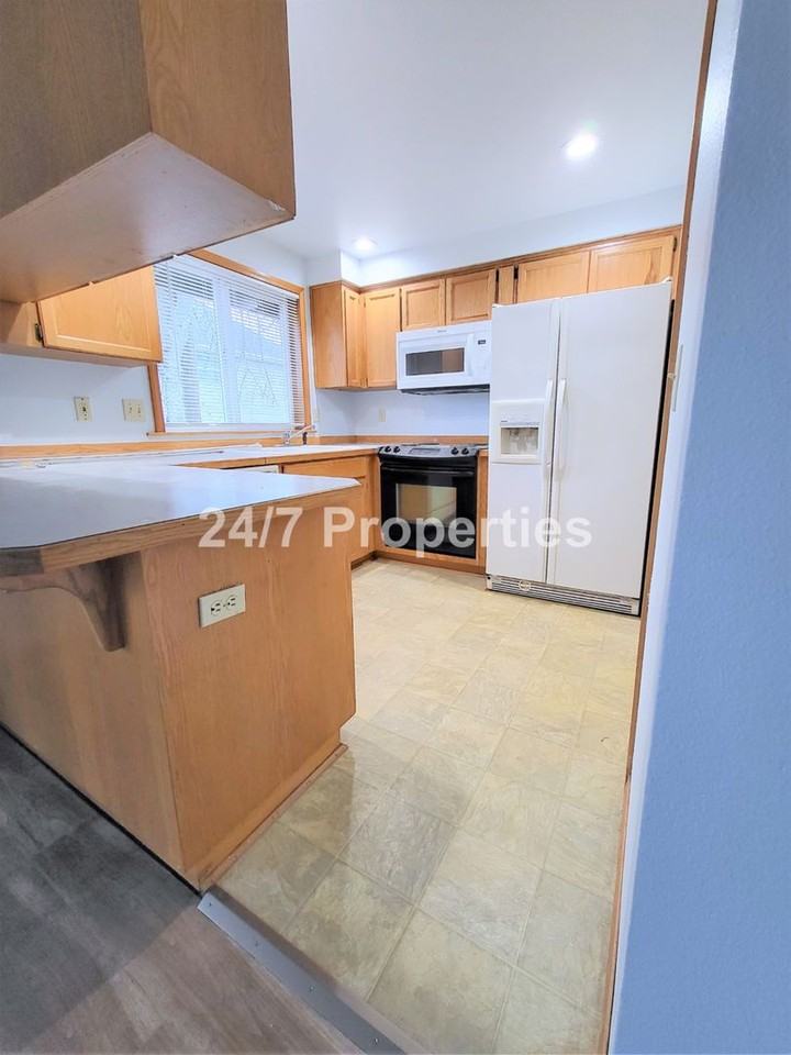 7166 Se Frances St - Photo 5 of 16