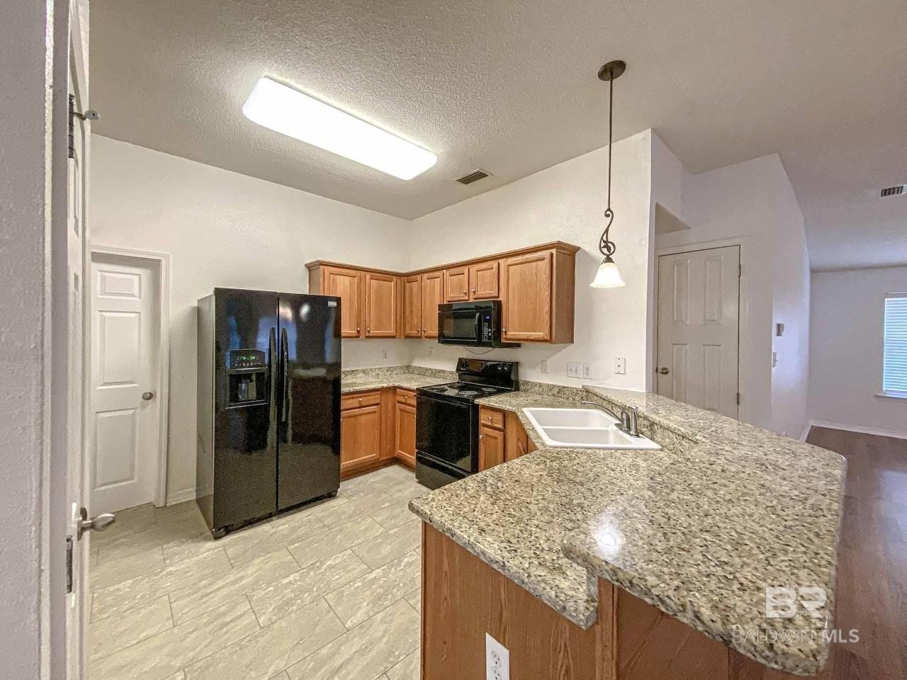 9841 Watkins Dr - Photo 3 of 16